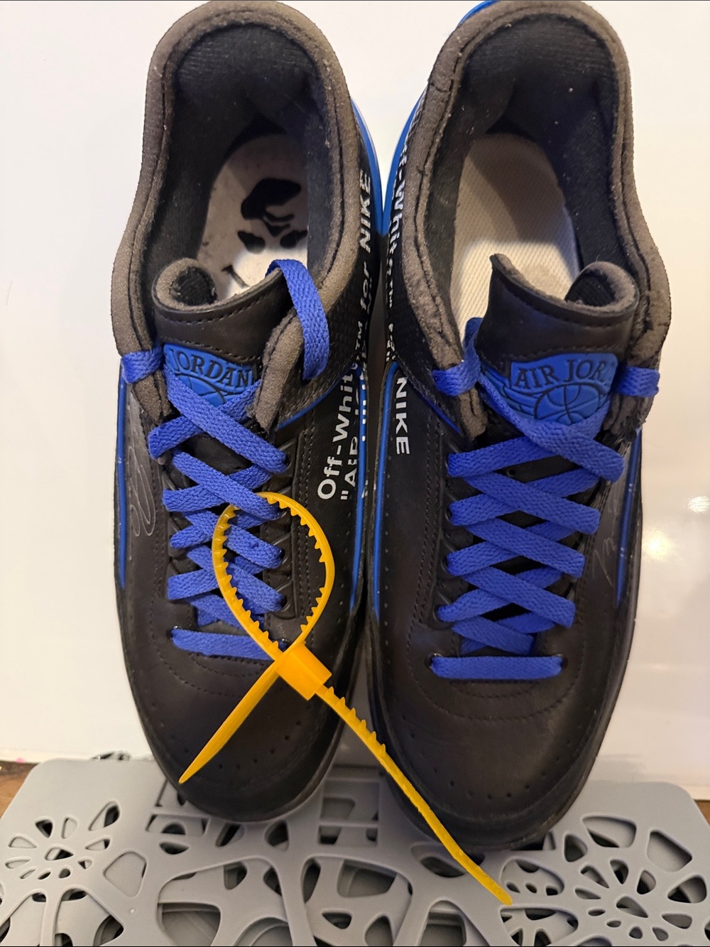 Jordan Low-Top Sneakers in Black and Blue with Yellow Tag